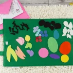 felt bug building set spread on felt play mat
